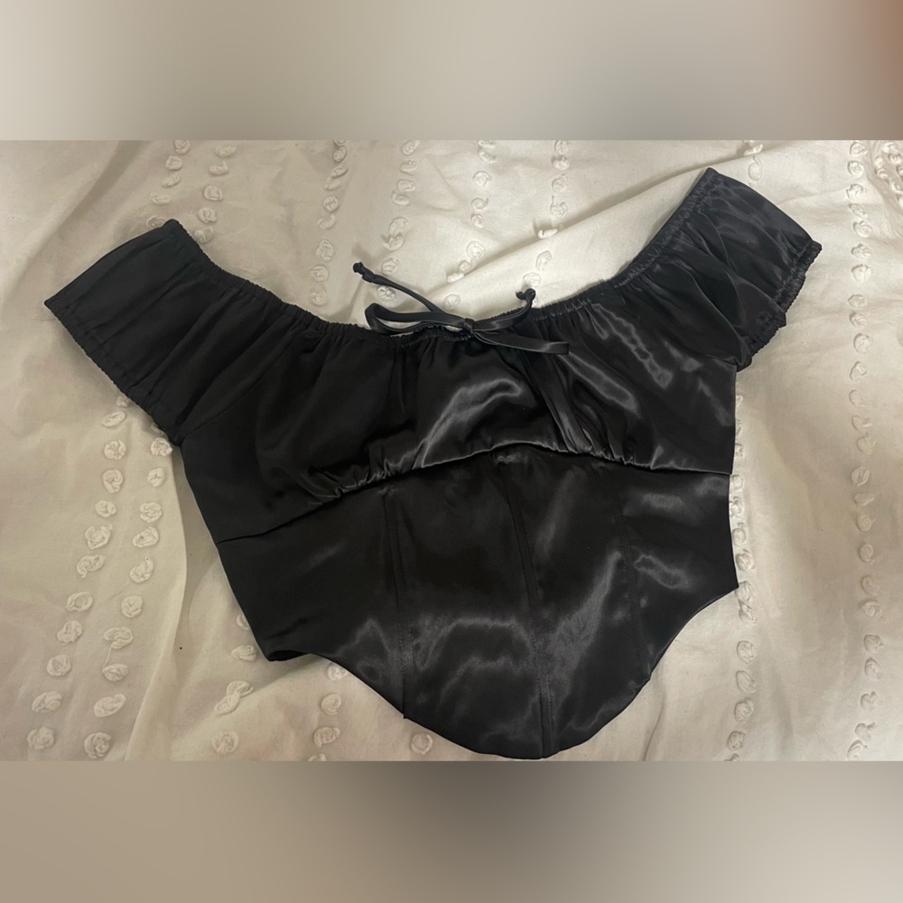 Sleek black corset top with sleeves and cute bow!